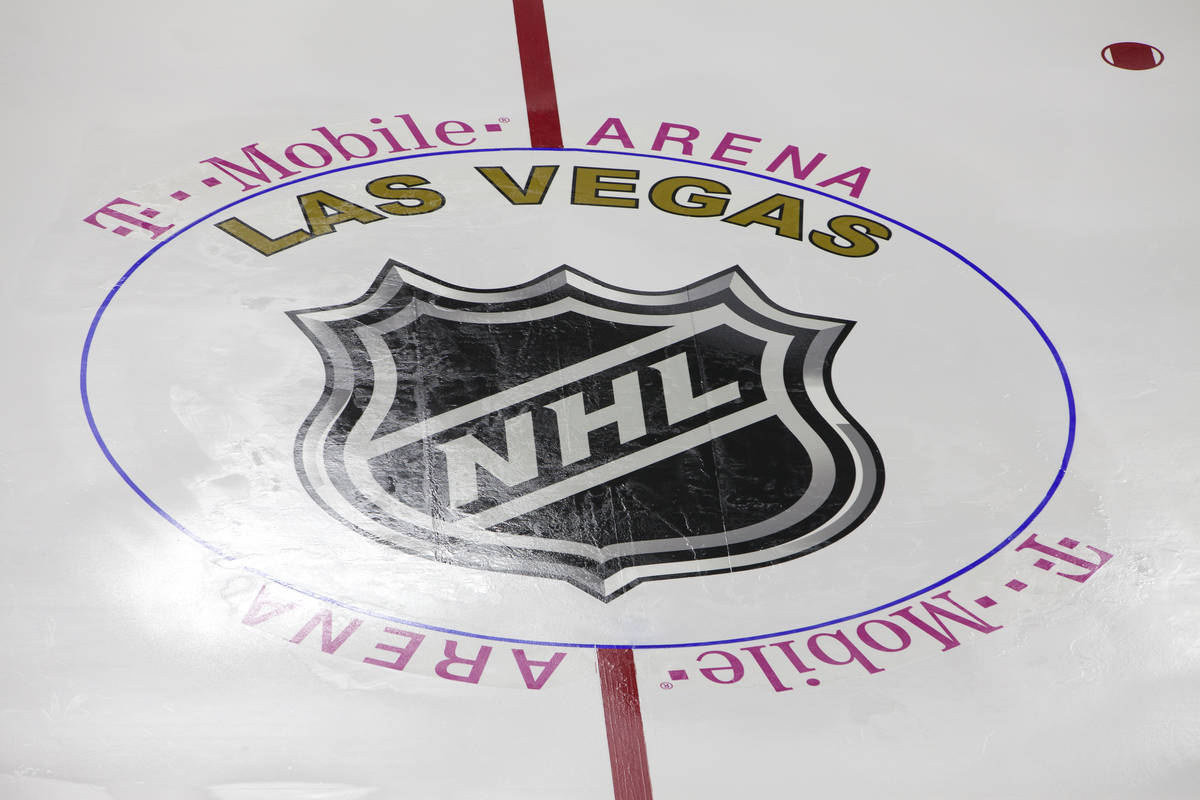 The Las Vegas NHL temporary logo is installed on the NHL rink at the T-Mobile Area in Las Vegas ...