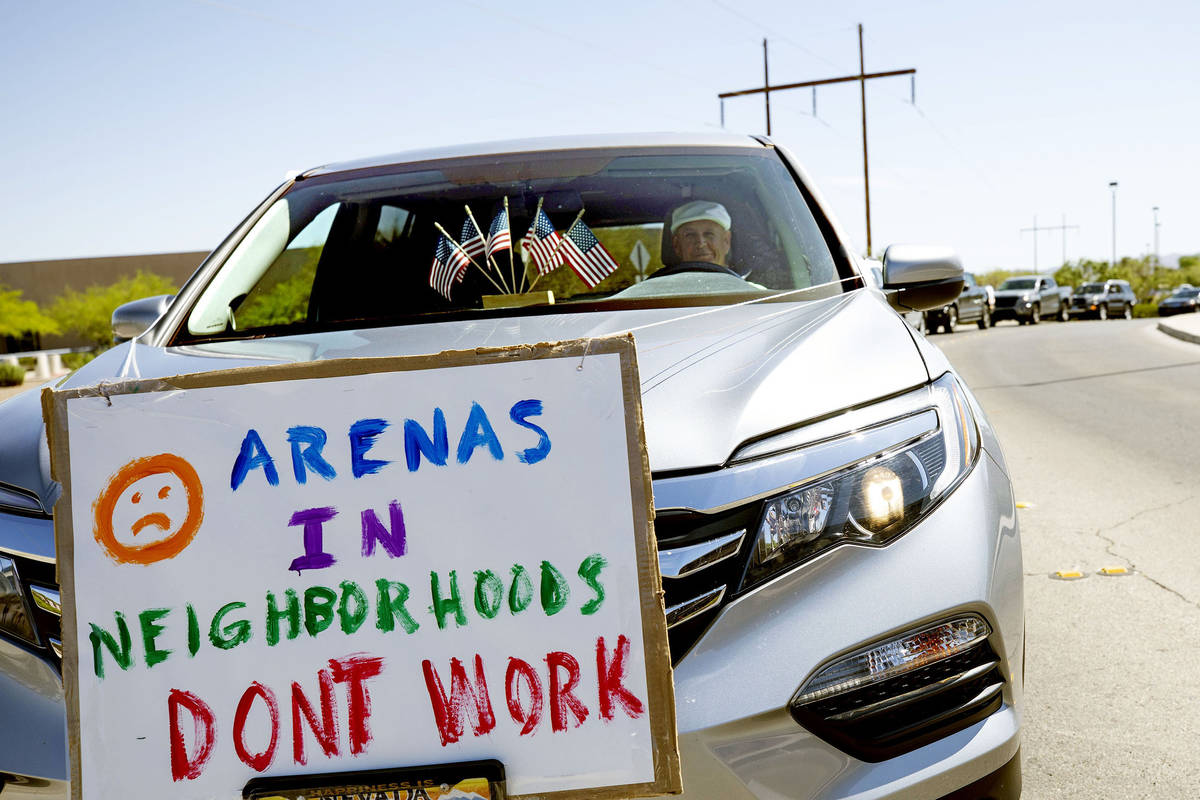 Gene Girard, who has lived in Green Valley since 1968, protests the building of a new hockey ar ...