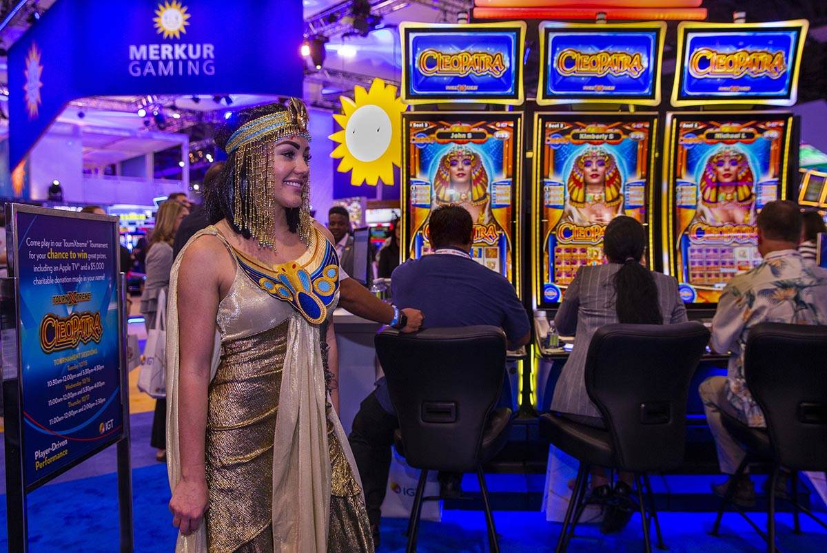 Cleopatra is on hand as attendees play the game on display in the IGT exhibition space during t ...