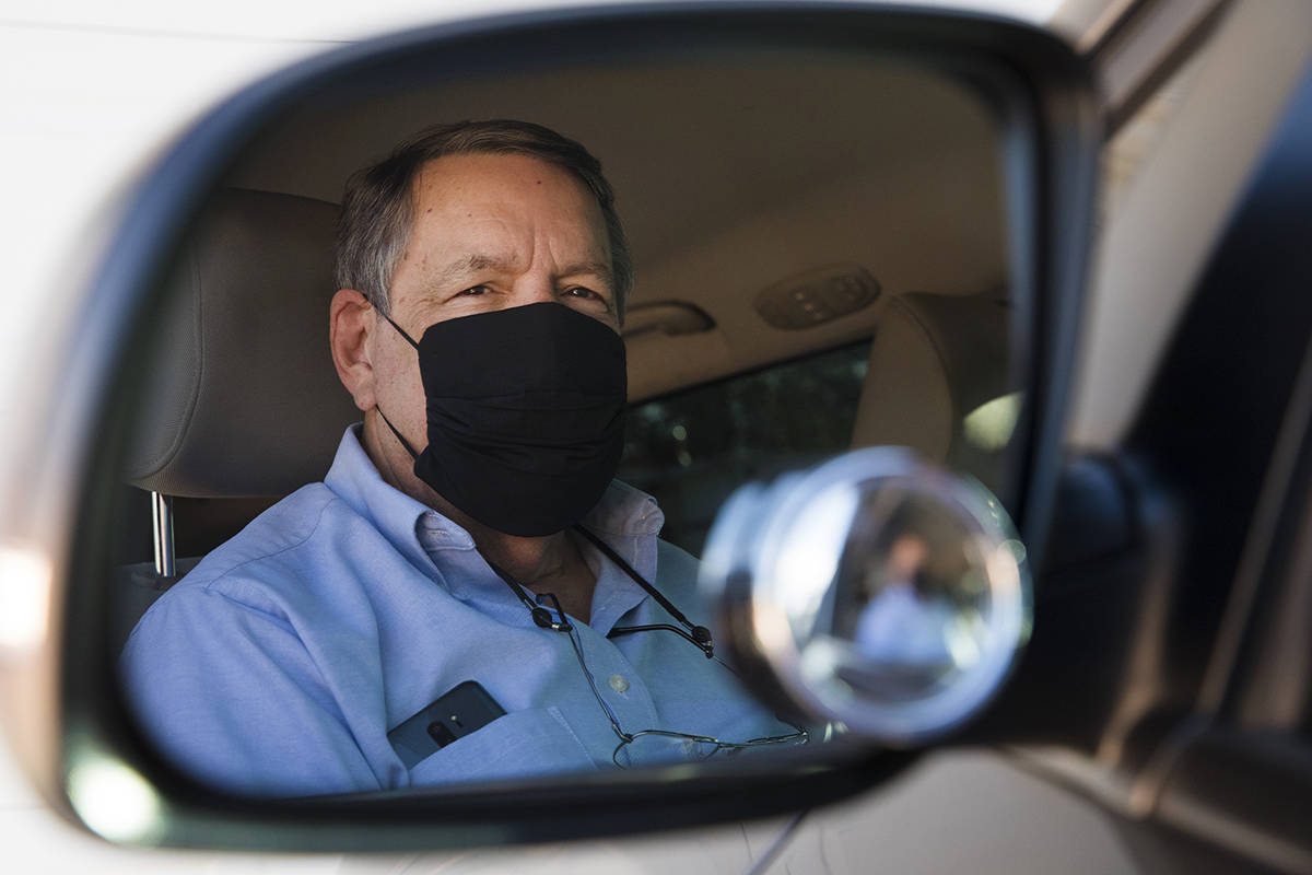 David Shapin, normally a full-time Uber and Lyft driver, in his car at his home in Las Vegas, M ...