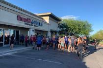 A large group gathered Monday, May 18, 2020, outside CrossFit Apollo in the northwest valley. ( ...