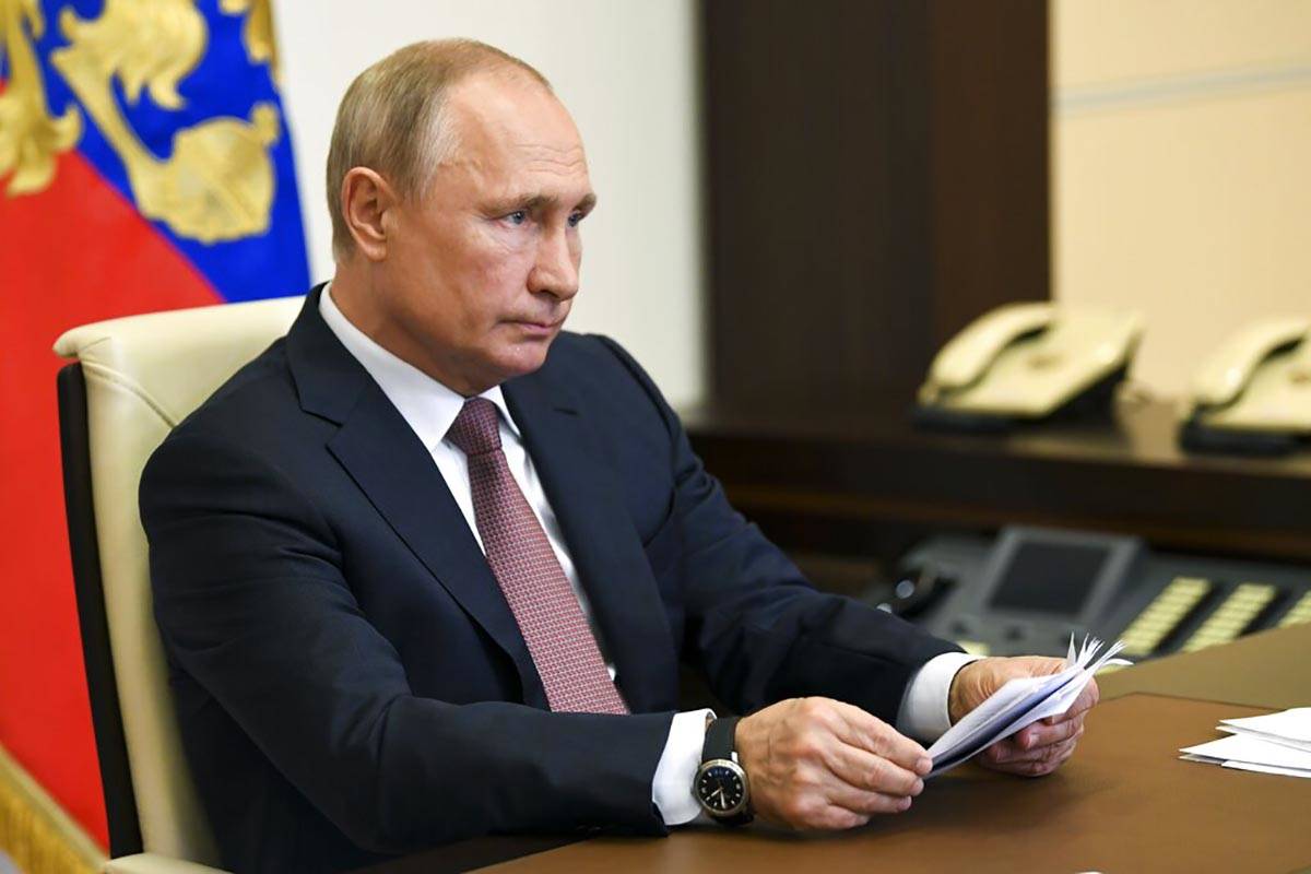 Russian President Vladimir Putin takes part in a video conference on the opening of medical fac ...