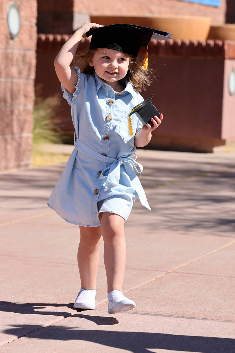 Aubrey Huth, 4, during drive-thru graduation for preschoolers at SkyView YMCA in Las Vegas Tues ...