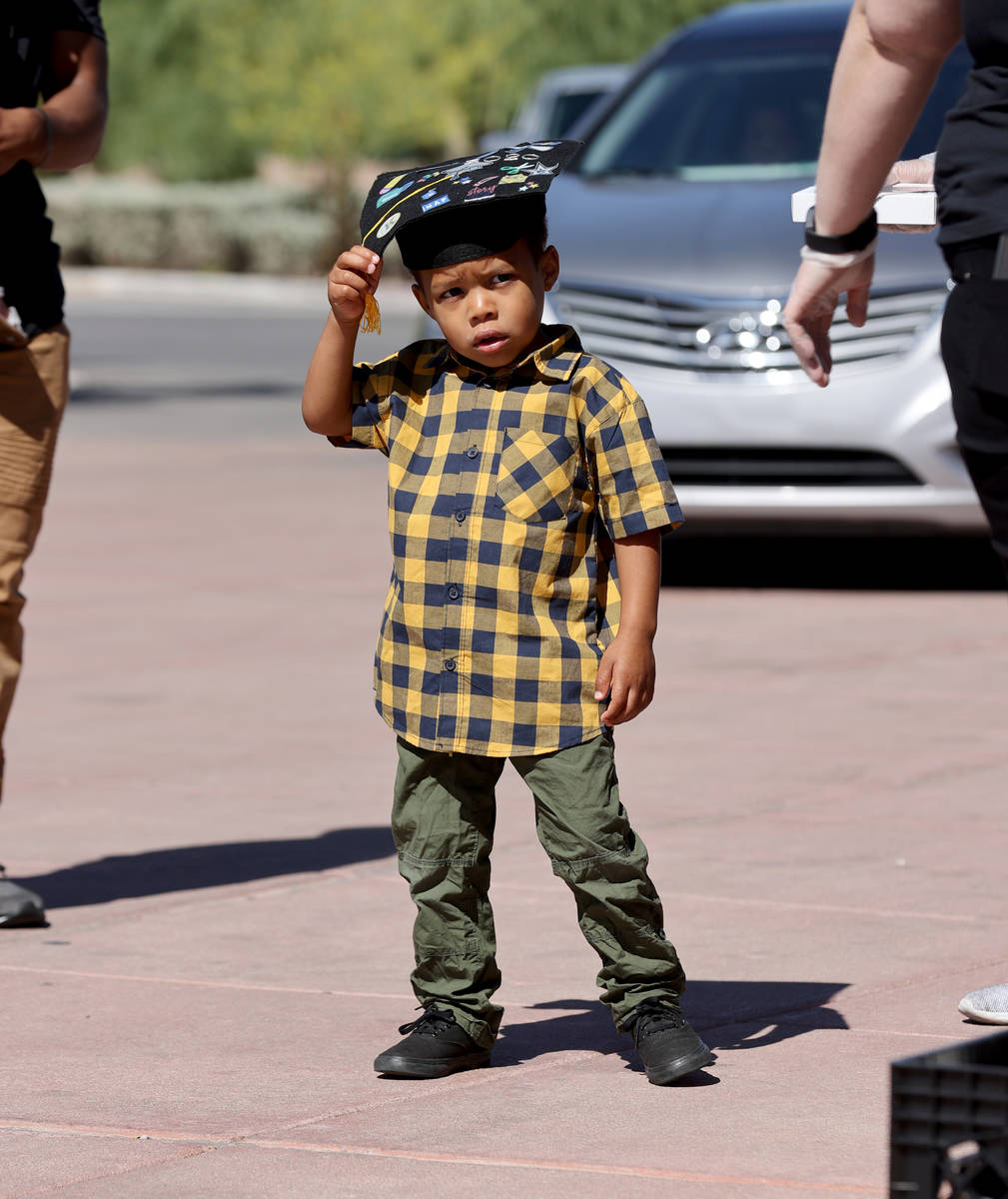 Shaddai Hayes Jr. 4, during drive-thru graduation for preschoolers at SkyView YMCA in Las Vegas ...