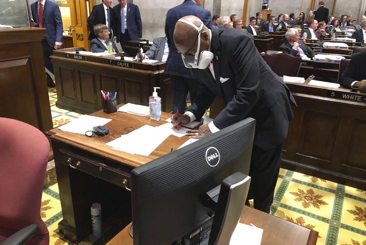 In a March 19, 2020, file photo State Rep. G.A. Hardaway, D-Memphis, wears a mask during House ...