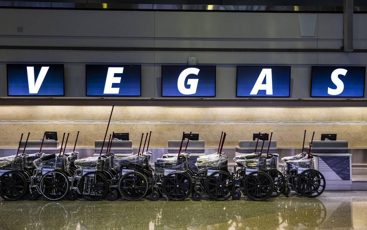 Wheelchairs sit by the Southwest counters at McCarran International Airport in Las Vegas on Fri ...