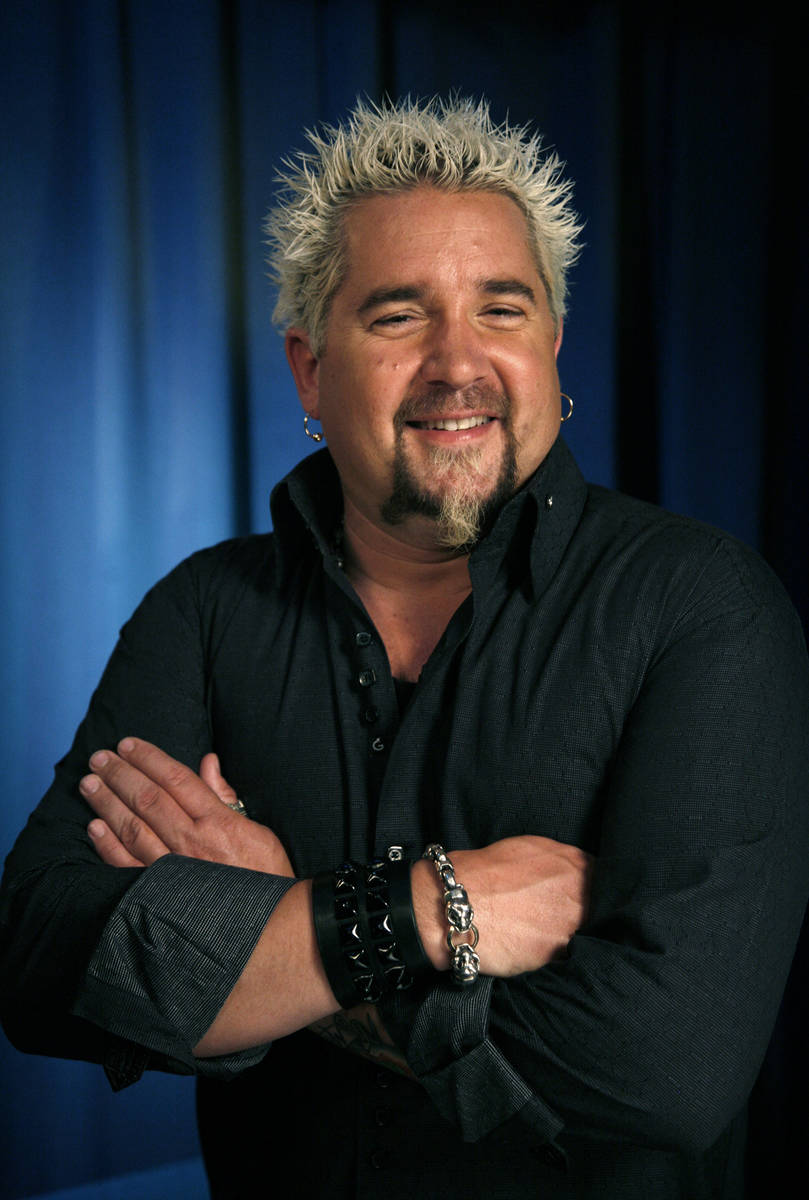 This Wednesday, May 4, 2011 file photo shows Guy Fieri as he poses for a portrait in New York.( ...