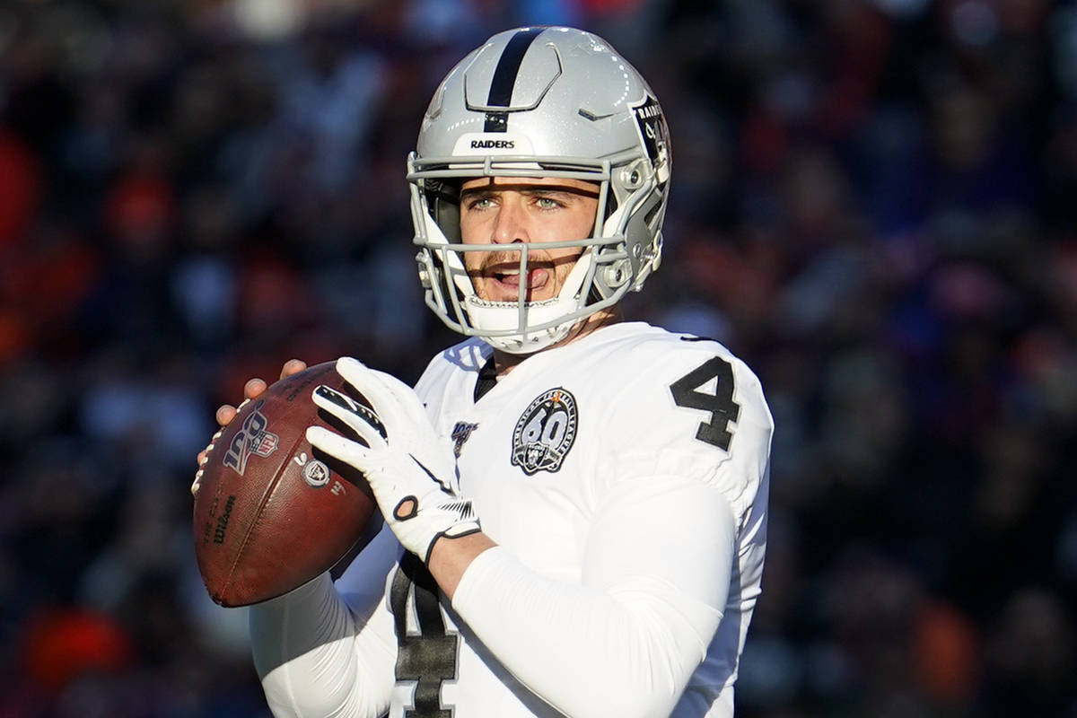 Oakland Raiders quarterback Derek Carr (4) throws a pass during the first half of an NFL footba ...