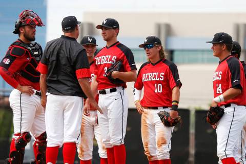 UNLV's baseball players talk during a visit to the mound against Air Force during the sixth inn ...