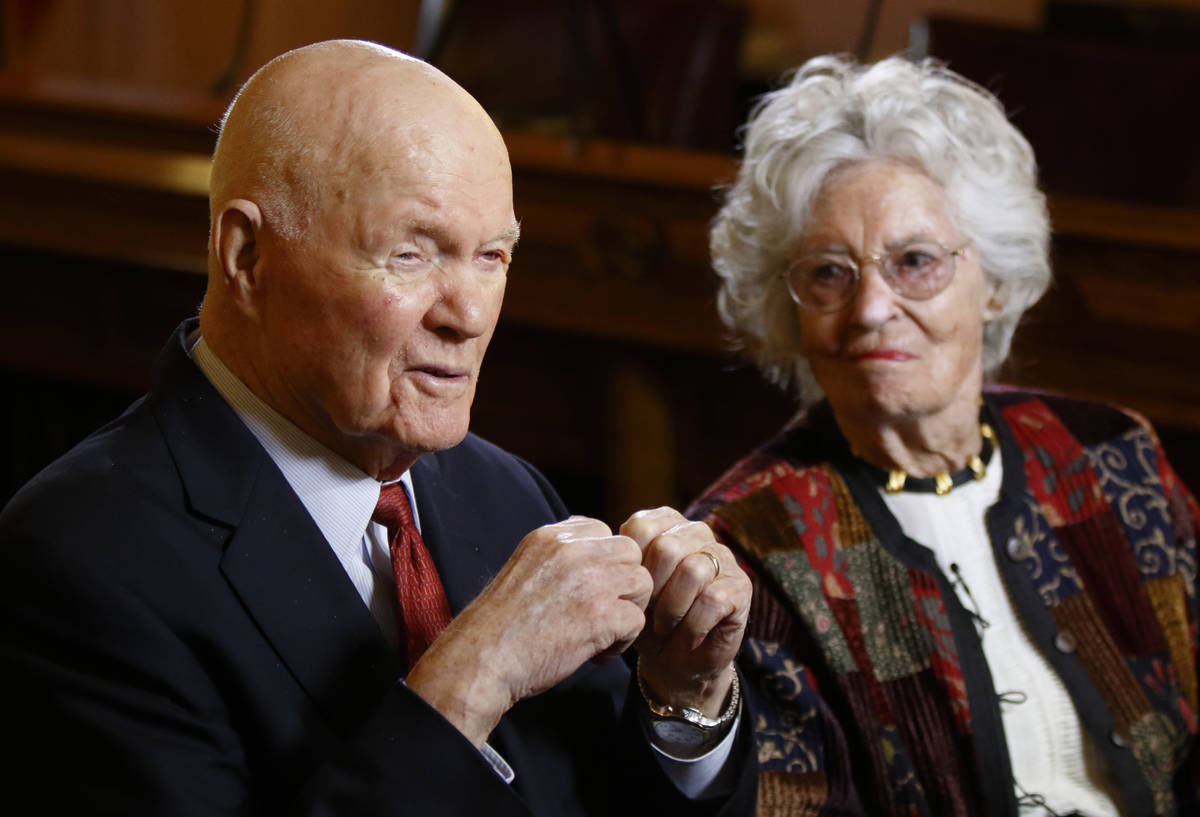 FILE - In this May 14, 2015, file photo, former astronaut and U.S. Sen. John Glenn, D-Ohio, lef ...