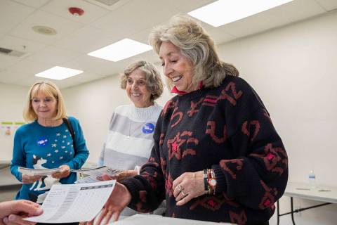 Rho Hudson, left, Betty Titus, center, and Rep. Dina Titus, D-Nev., cast their early vote at Ca ...