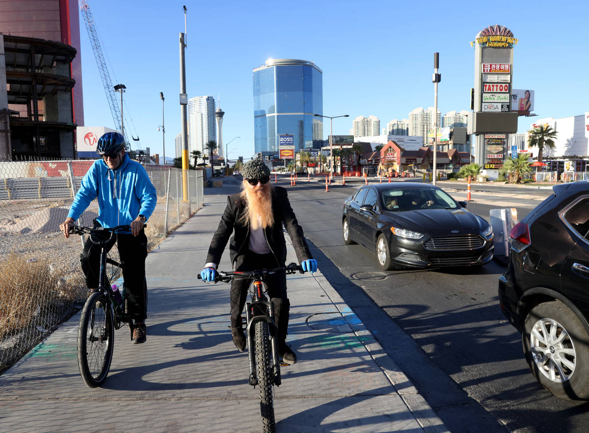 Las Vegas resident and ZZ Top frontman Billy Gibbons rides down the Strip in Las Vegas with Las ...