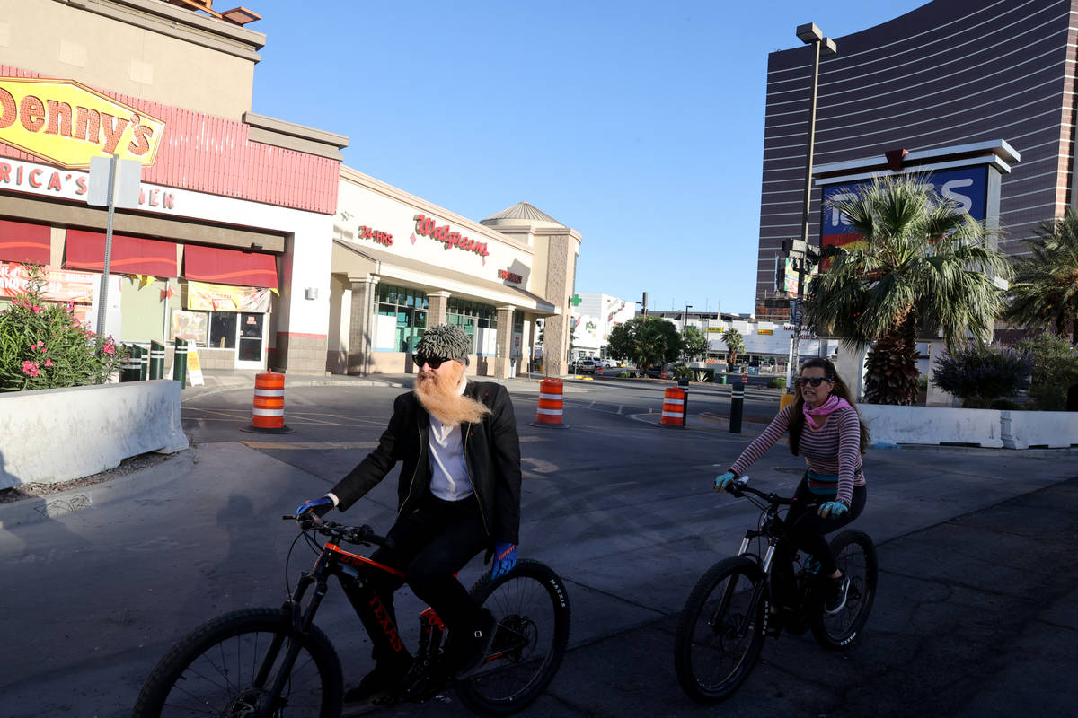 Las Vegas resident and ZZ Top frontman Billy Gibbons rides up the Strip in Las Vegas with his w ...