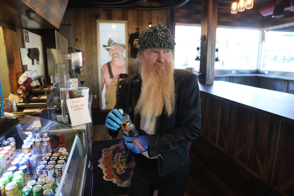 Las Vegas resident and ZZ Top frontman Billy Gibbons takes a water break at Rick's Rollin' Smok ...