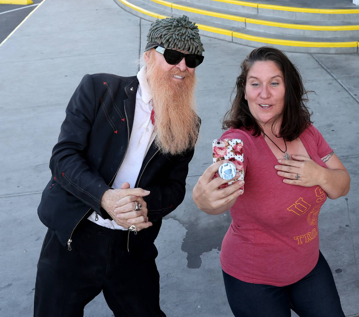 Las Vegas resident and ZZ Top frontman Billy Gibbons takes a selfie with Jessica Carlile of Las ...