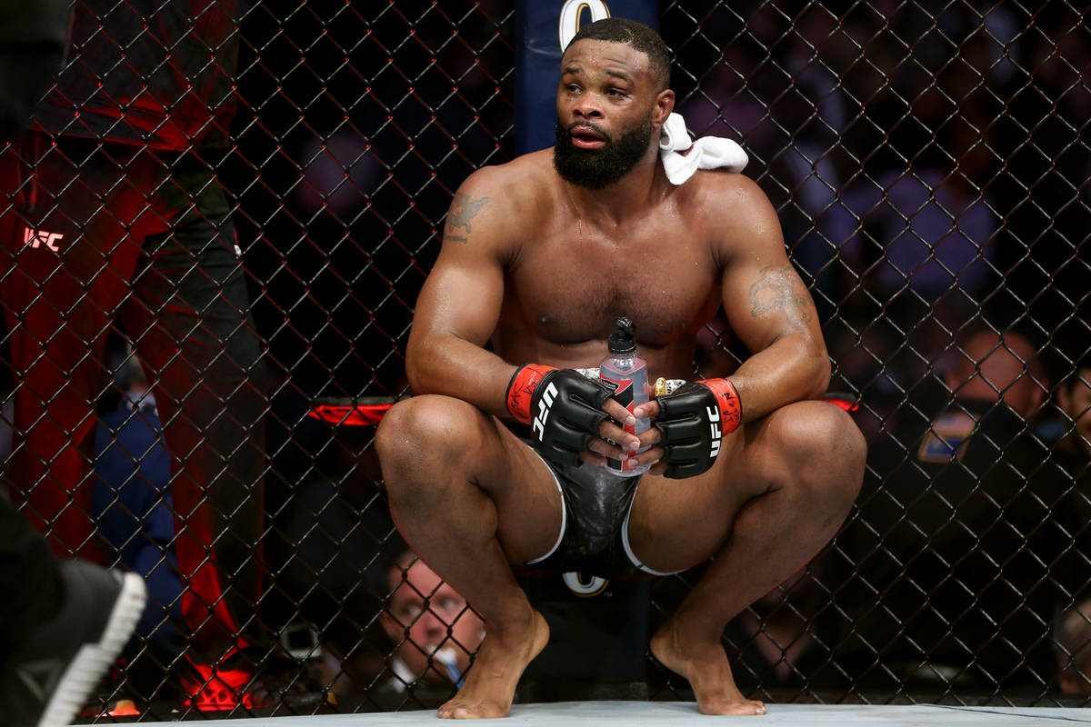Tyron Woodley reacts after his fight against Kamaru Usman in the welterweight title bout during ...
