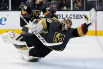 Vegas Golden Knights goaltender Marc-Andre Fleury (29) dives to make a glove save against the T ...