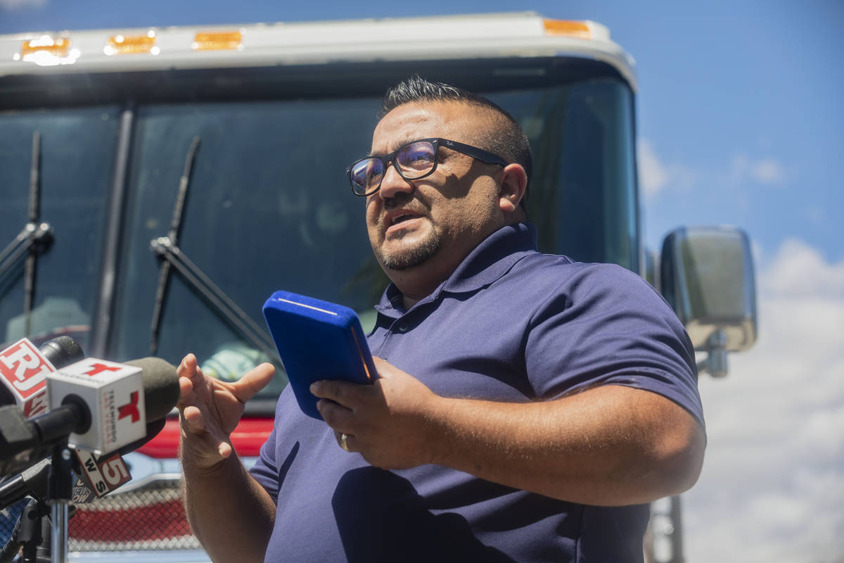 Jose Alvarado speaks with the media while holding a medal received from the North Las Vegas Fir ...