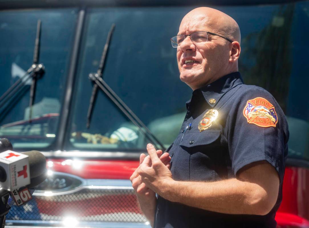 North Las Vegas Fire Chief Joseph Calhoun speaks to the media honoring civilians Jose Alvarado ...