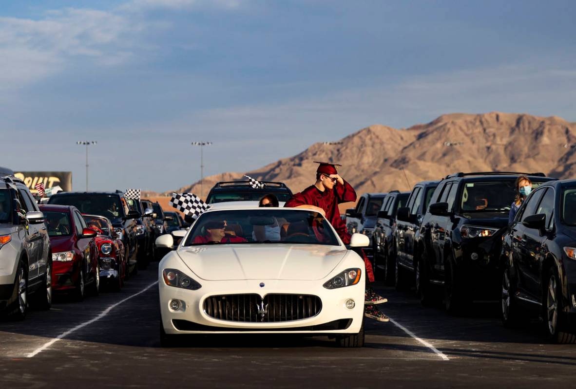 Faith Lutheran High School student Trevor Barrett watches a video presentation after turning hi ...