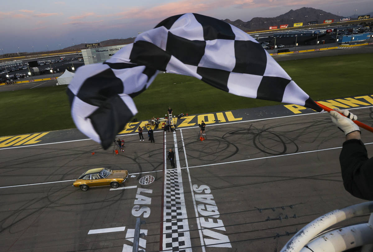 A Faith Lutheran High School student approaches the start/finish line for their diploma during ...