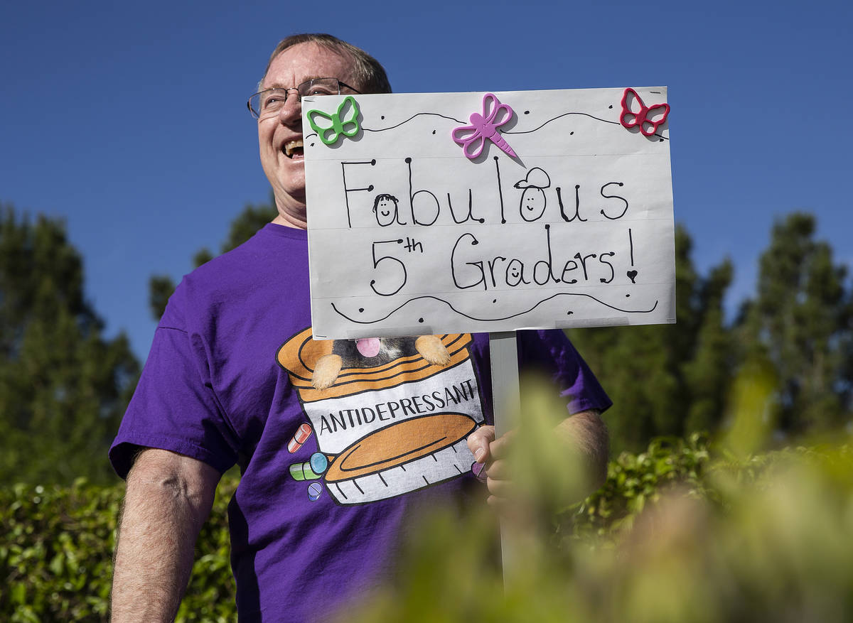 Gary Grosenick, a teacher at John & Judy Goolsby Elementary School, smiles at friends, staf ...