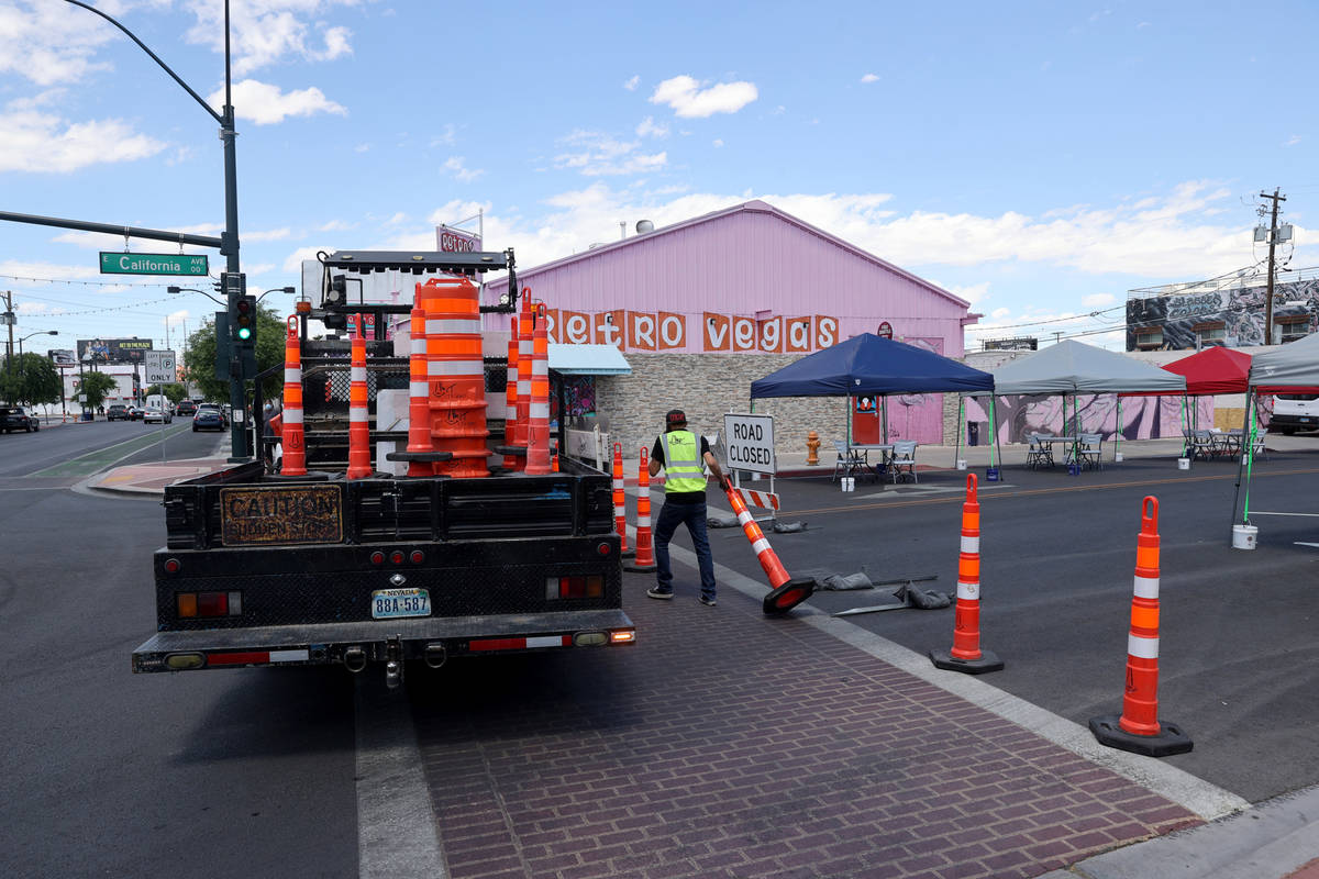 Eric Maldonado with of Work Zone Traffic Services, Inc. closes California Avenue at Main Street ...