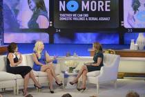 Former New Mexico kicker Katie Hnida, center, is an advocate for sexual-assault victims. Photo ...