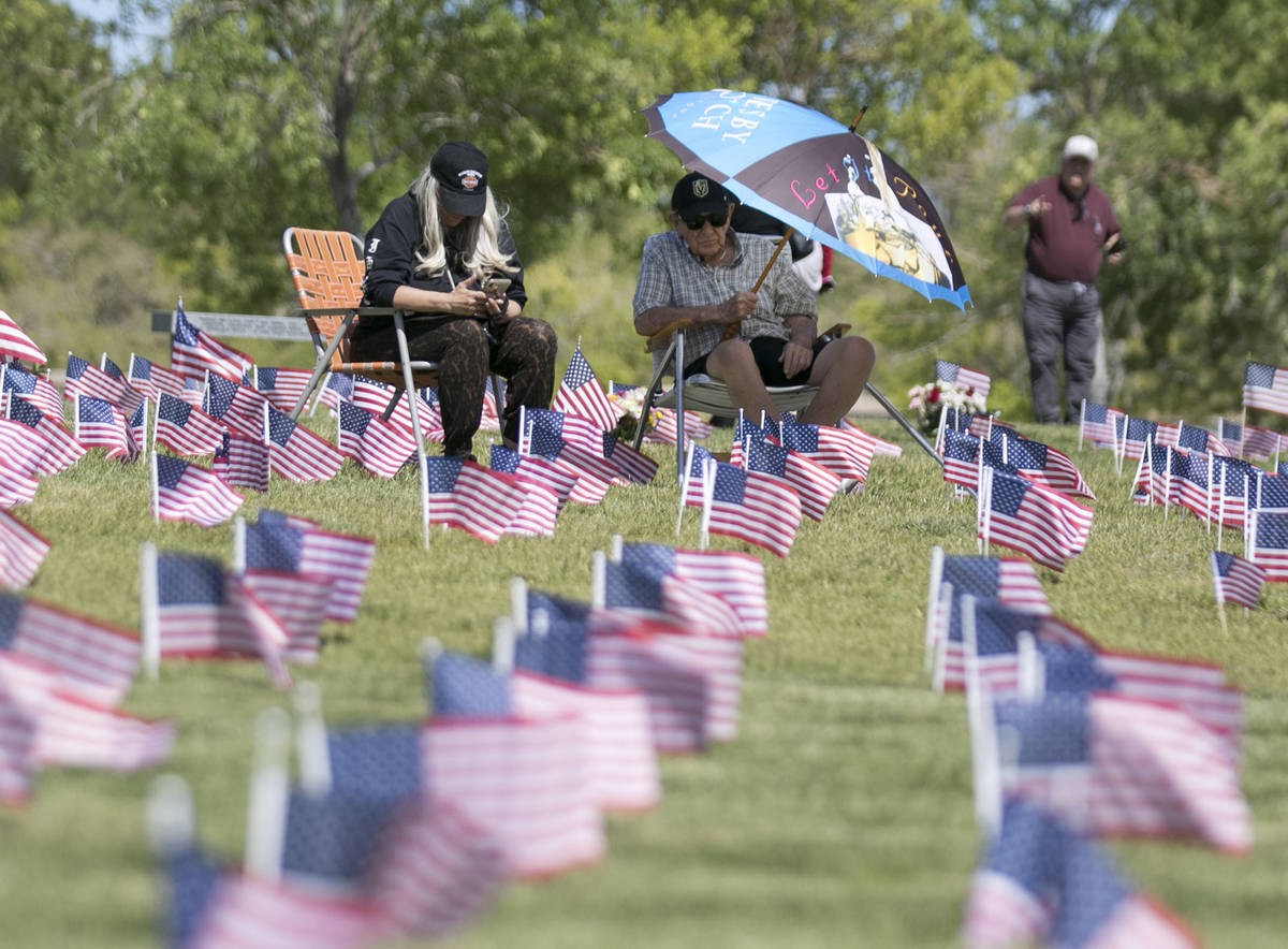 U.S. Army Pfc. Daniel Ventura, right, visits his wife Connie's grave site with his daughter, Lu ...