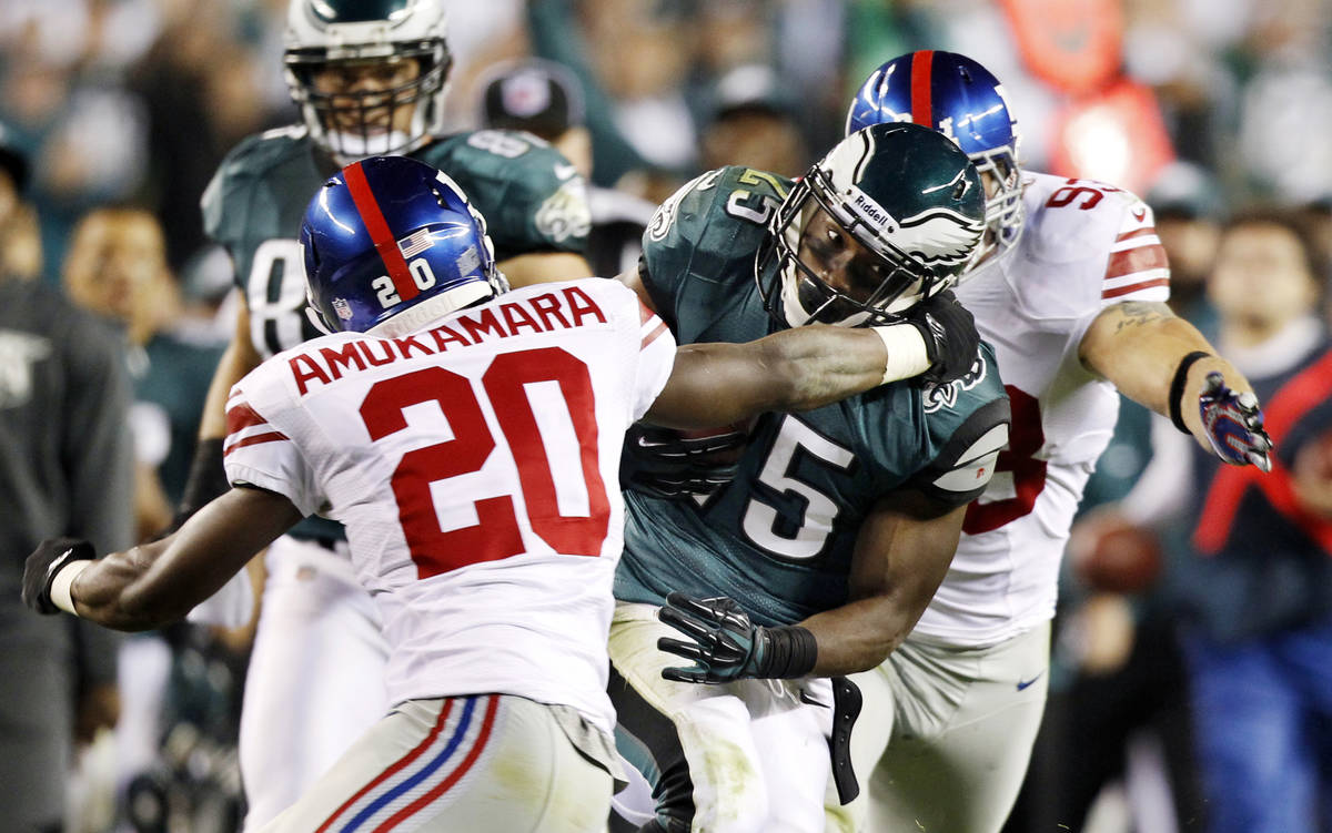 New York Giants corner back Prince Amukamara (20) tries to tackle Philadelphia Eagles running b ...