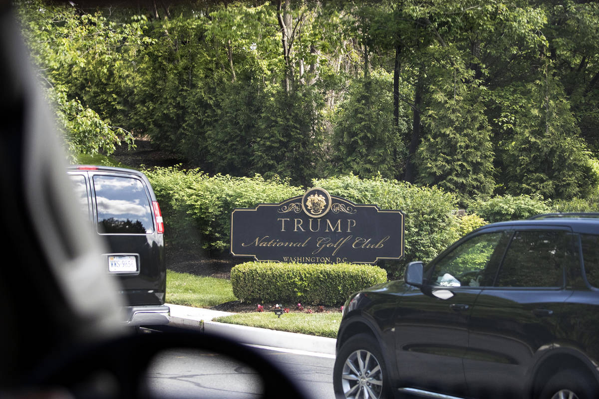 The motorcade for President Donald Trump arrives at Trump National Golf Club, Saturday, May 23, ...