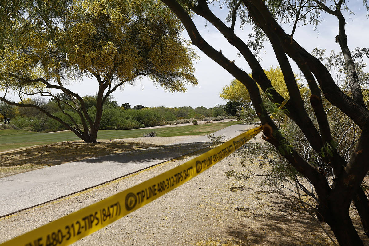 Police tape cordon off an area near the site of a plane crash that killed several people Tuesda ...