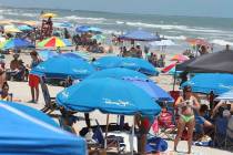 Cocoa Beach, Fla., is packed with Memorial Day beachgoers on Saturday, May 23, 202 The beaches ...
