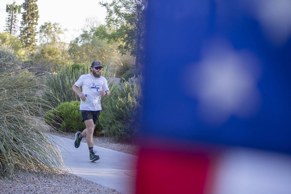 Peter Makredes runs laps around Exploration Peak Park to raise money for Mission 22, an organiz ...