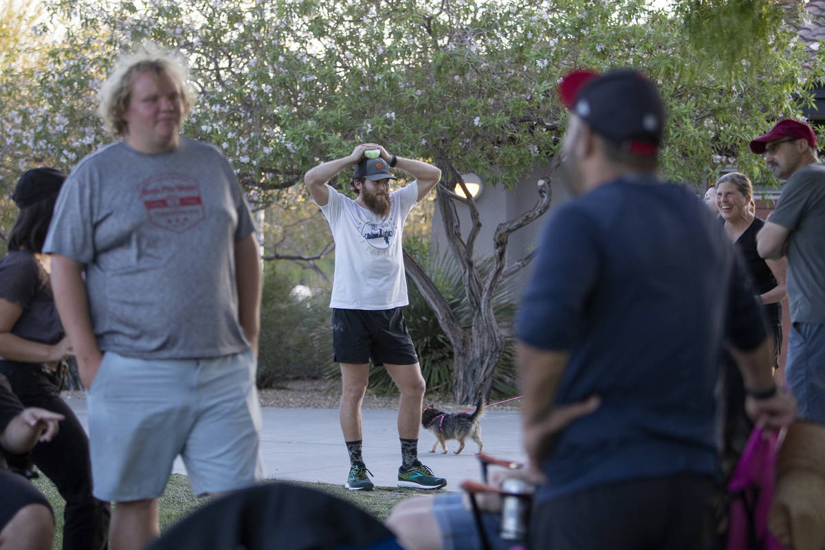 Peter Makredes takes a break from running with his friends and family at Exploration Peak Park ...