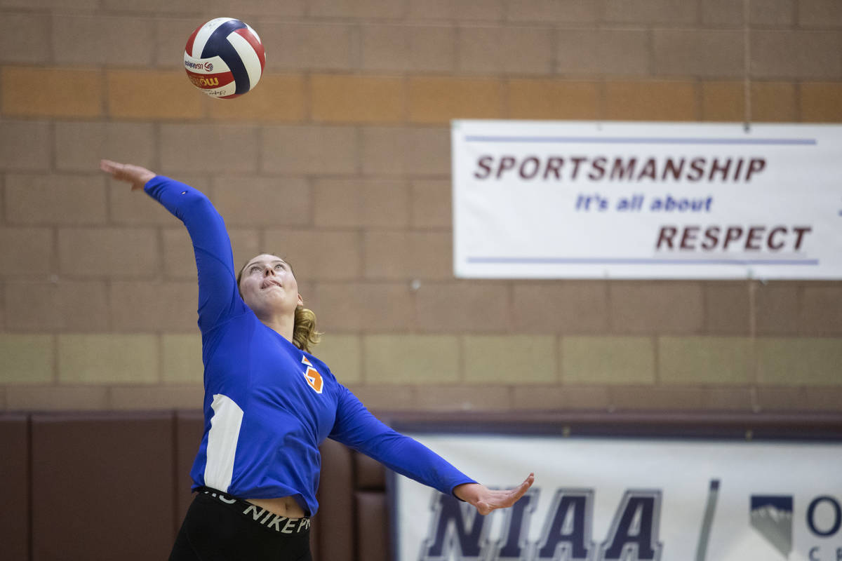 Bishop Gorman's Tommi Stockham (3) serves the ball during the Class 4A state volleyball champio ...