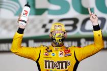 Kyle Busch (54) celebrates after winning the NASCAR Xfinity Series auto race at Charlotte Motor ...