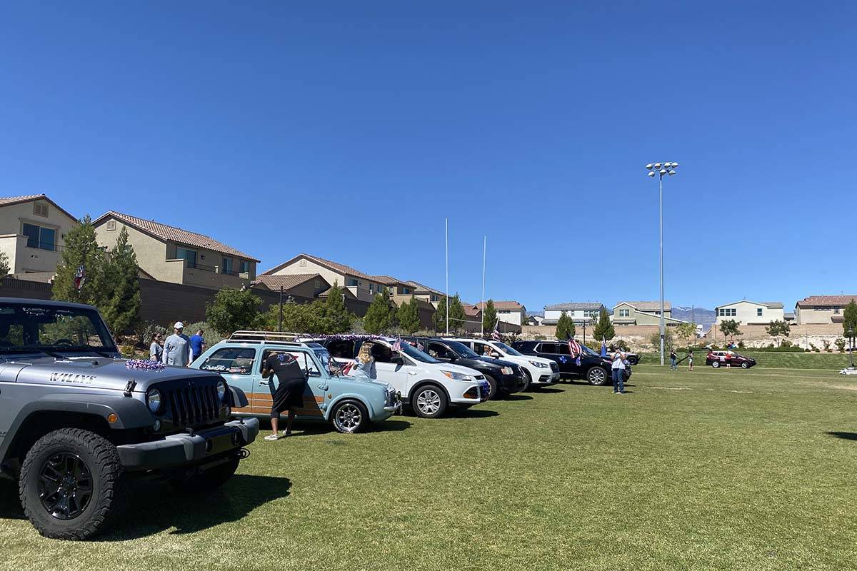 Residents get the vehicles ready at Skye Canyon Park to take part in community’s inaugur ...