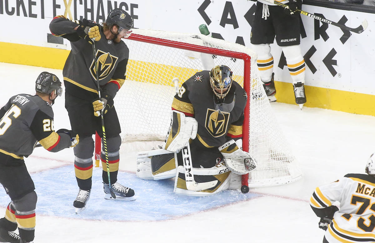 Golden Knights goaltender Marc-Andre Fleury (29) blocks a shot from the Boston Bruins during th ...