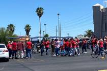 Employees at Target, 4001 S. Maryland Parkway in Las Vegas, wait outside the store after a smal ...