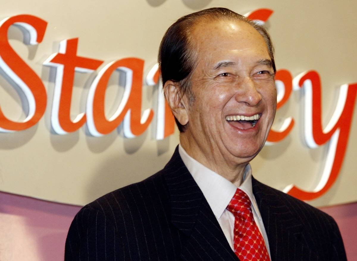 Macao tycoon Stanley Ho smiles during a party to celebrate his 85th birthday in Hong Kong, Nov. ...