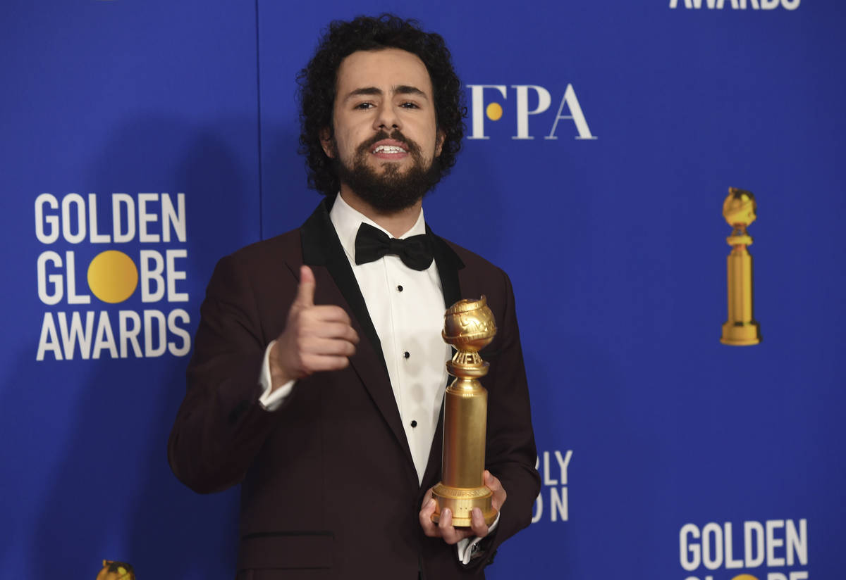 Ramy Youssef poses in the press room with the award for best performance by an actor in a telev ...