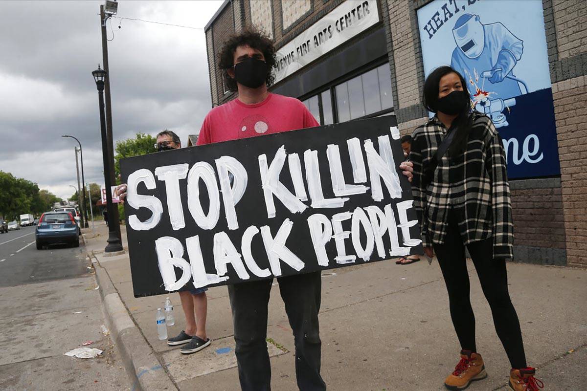 Protesters gather near the site of the death of a man, Tuesday, May 26, 2020, who died in polic ...