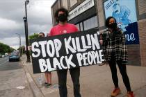 Protesters gather near the site of the death of a man, Tuesday, May 26, 2020, who died in polic ...