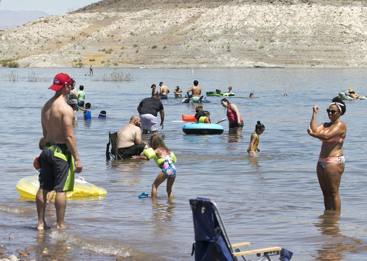 People cool themselves at Boulder beach in the Lake Mead National Recreation Area on Wednesday, … | Las Vegas Review-Journal