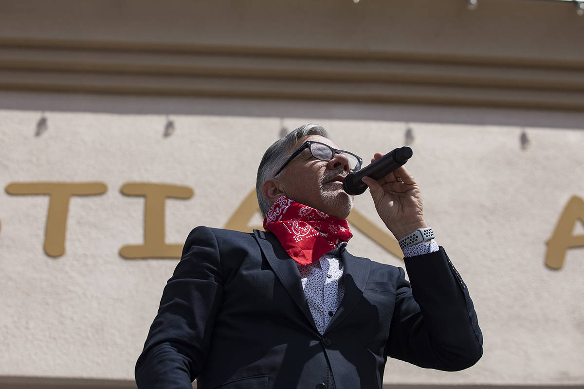 Pastor Paul Marc Goulet leads an Easter service in the parking lot at International Church of L ...