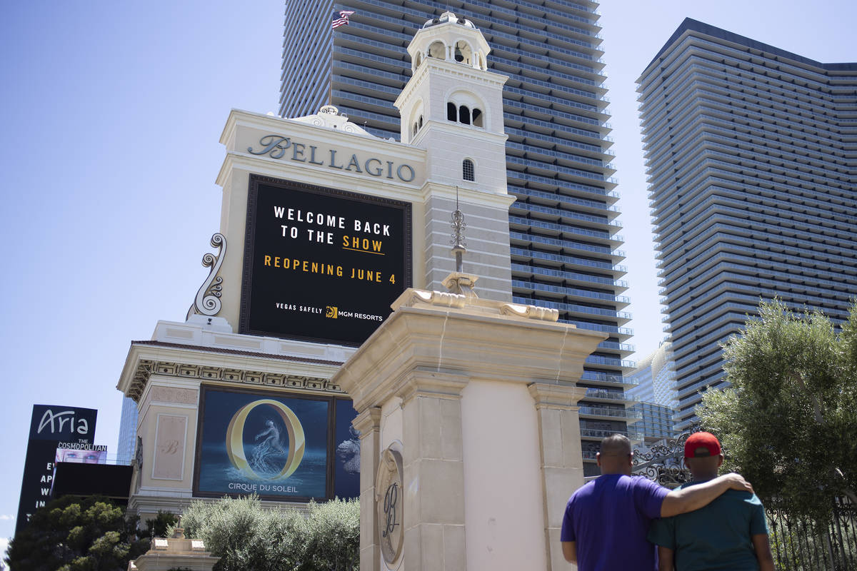 The Bellagio marquee says the hotel and casino, owned big MGM Resorts International, will open ...