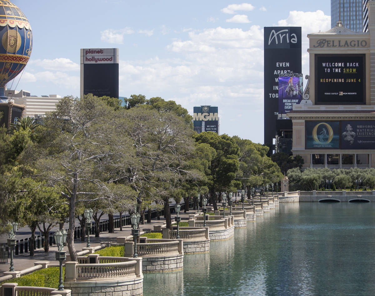 The Bellagio marquee says the hotel and casino, owned big MGM Resorts International, will open ...