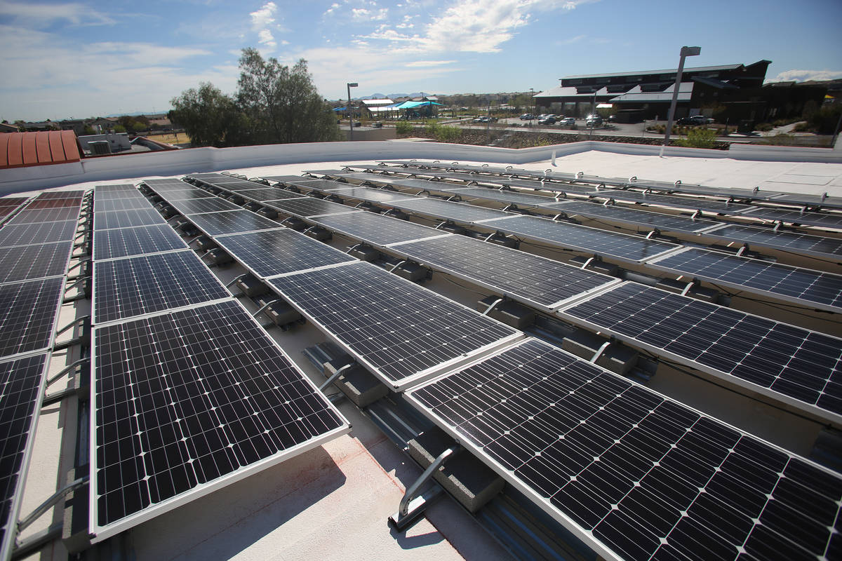 In this March 12, 2018, file photo, solar panels line the roof of Wilbur and Theresa Faiss Midd ...