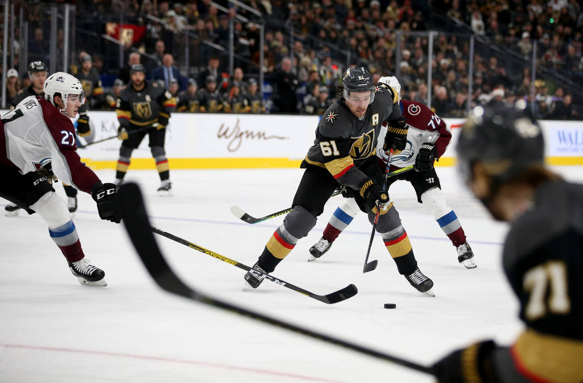Vegas Golden Knights right wing Mark Stone (61) and Colorado Avalanche defenseman Ryan Graves ( ...